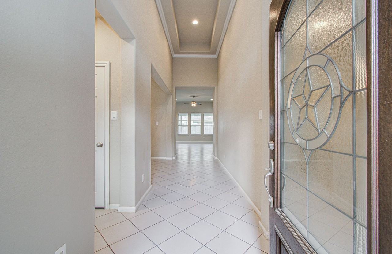 15702 Whisper Woods Dr - Photo 4 of 31