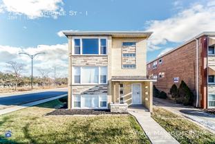 7906 S Whipple St #1 - Photo 1 of 1