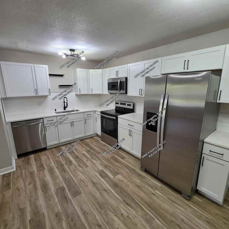 7610 E 113th St - Photo 6 of 24