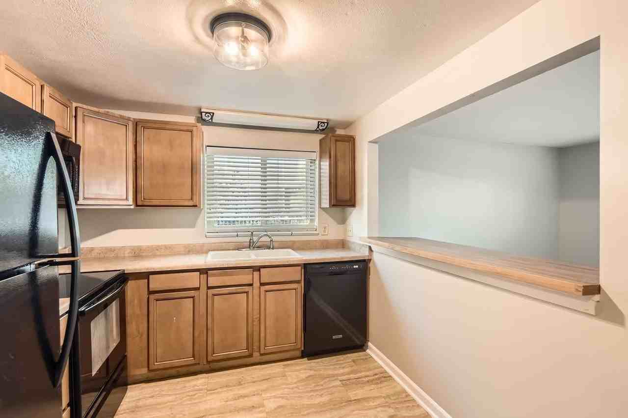 4725 S Acoma St - Photo 4 of 13