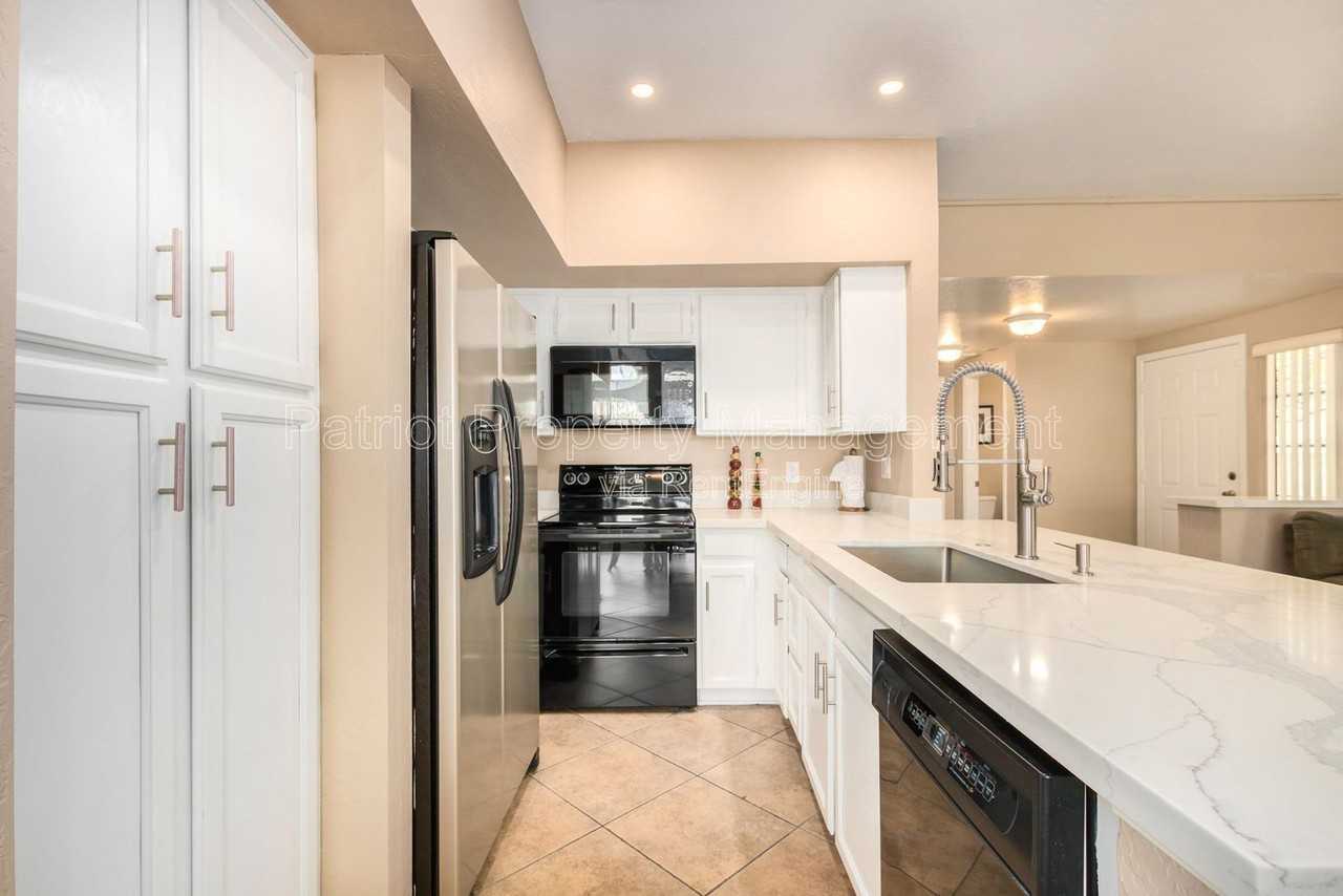 9705 E Mountain View Rd #1015 - Photo 6 of 38