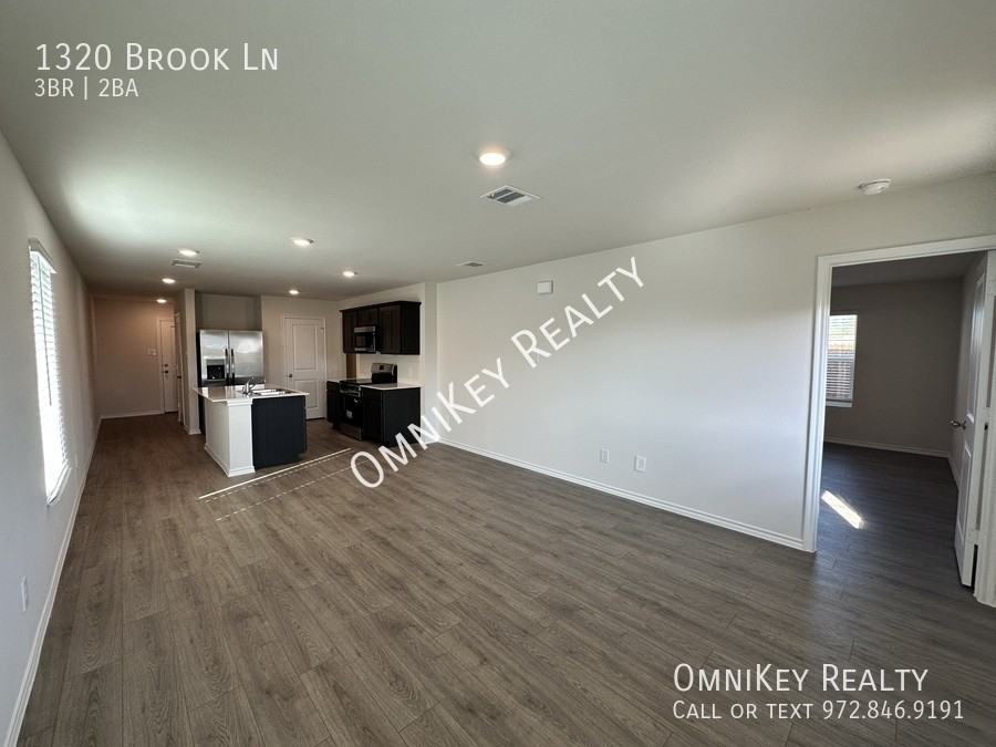 BROOK & - Photo 2 of 14