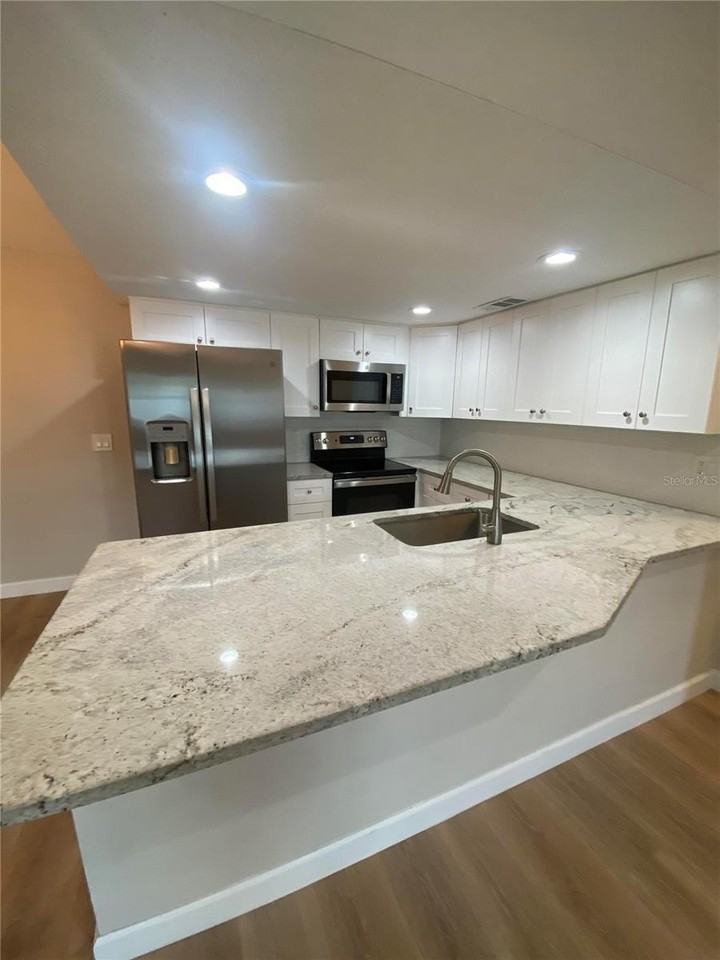 15301 58th St N #A - Photo 2 of 13