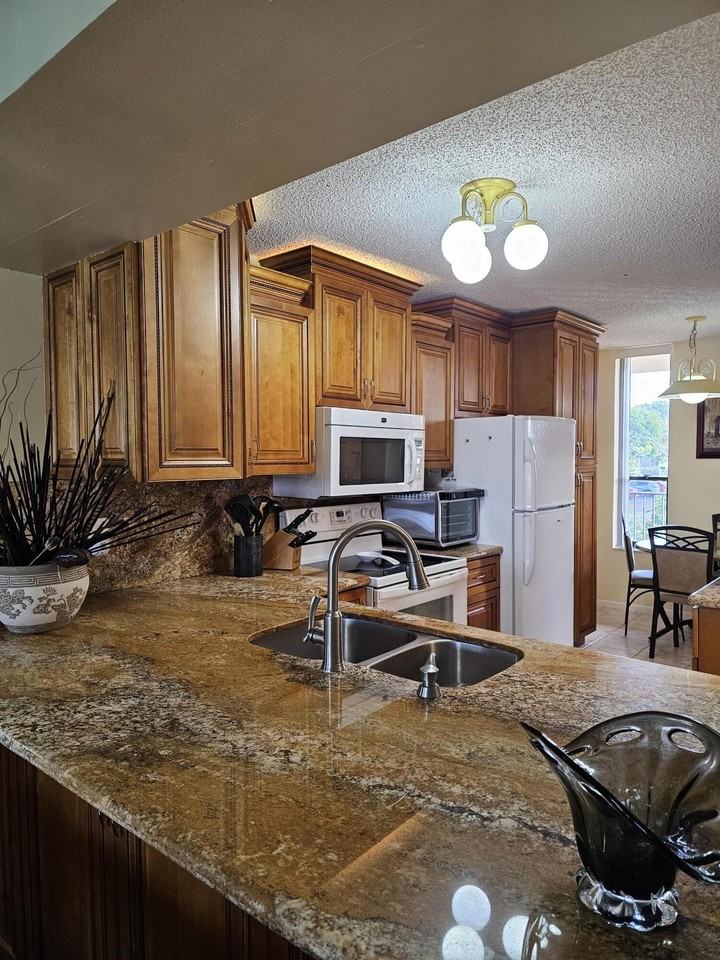 6017 Coral Lake Dr #205 - Photo 7 of 34