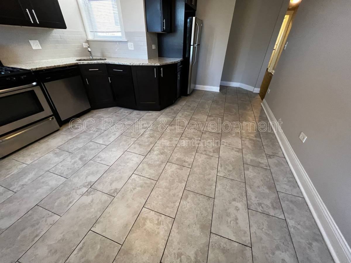 6031 S Eberhart Ave #2 - Photo 2 of 10