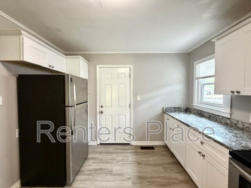 4689 S Troost Ave - Photo 7 of 21