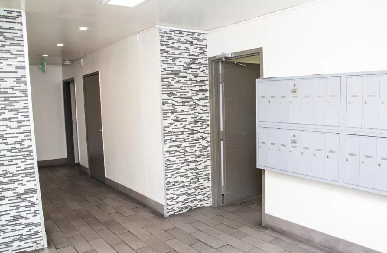 HAR - Harvard Apartments - Photo 2 of 4