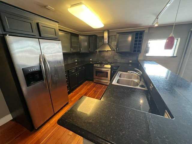 2002 E 11th St #K - Photo 2 of 3