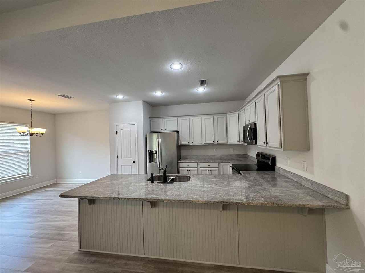 5723 Maggie Rose Cir - Photo 3 of 37