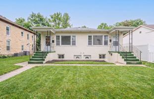 featured image of 411 W 5th St