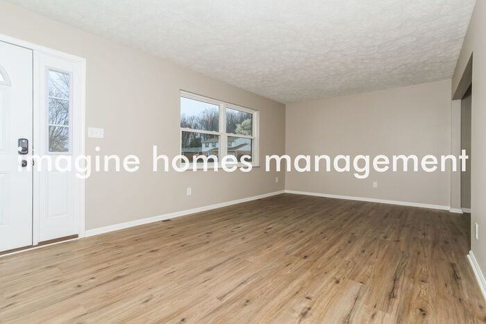 1409 Hilltree Dr - Photo 4 of 20