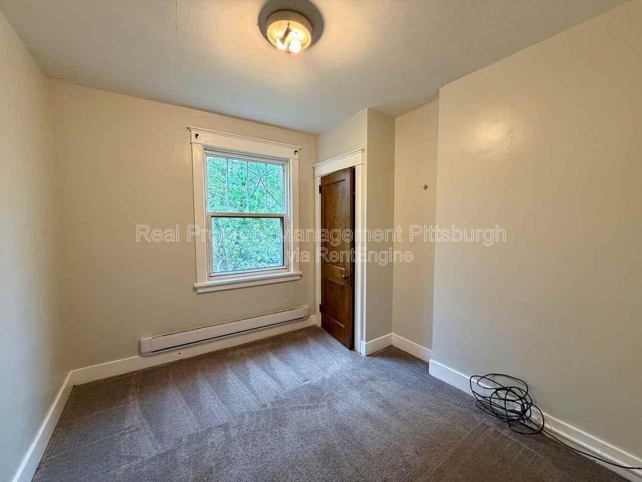 5550 Wilkins Ave - Photo 3 of 14