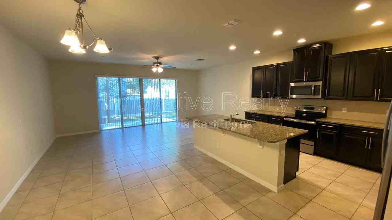 7490 Aloma Pines Ct - Photo 2 of 16