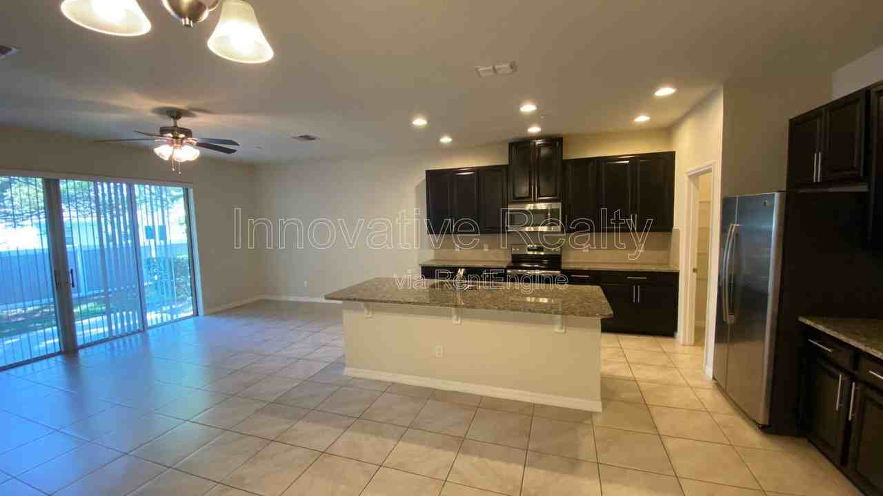 7490 Aloma Pines Ct - Photo 3 of 16