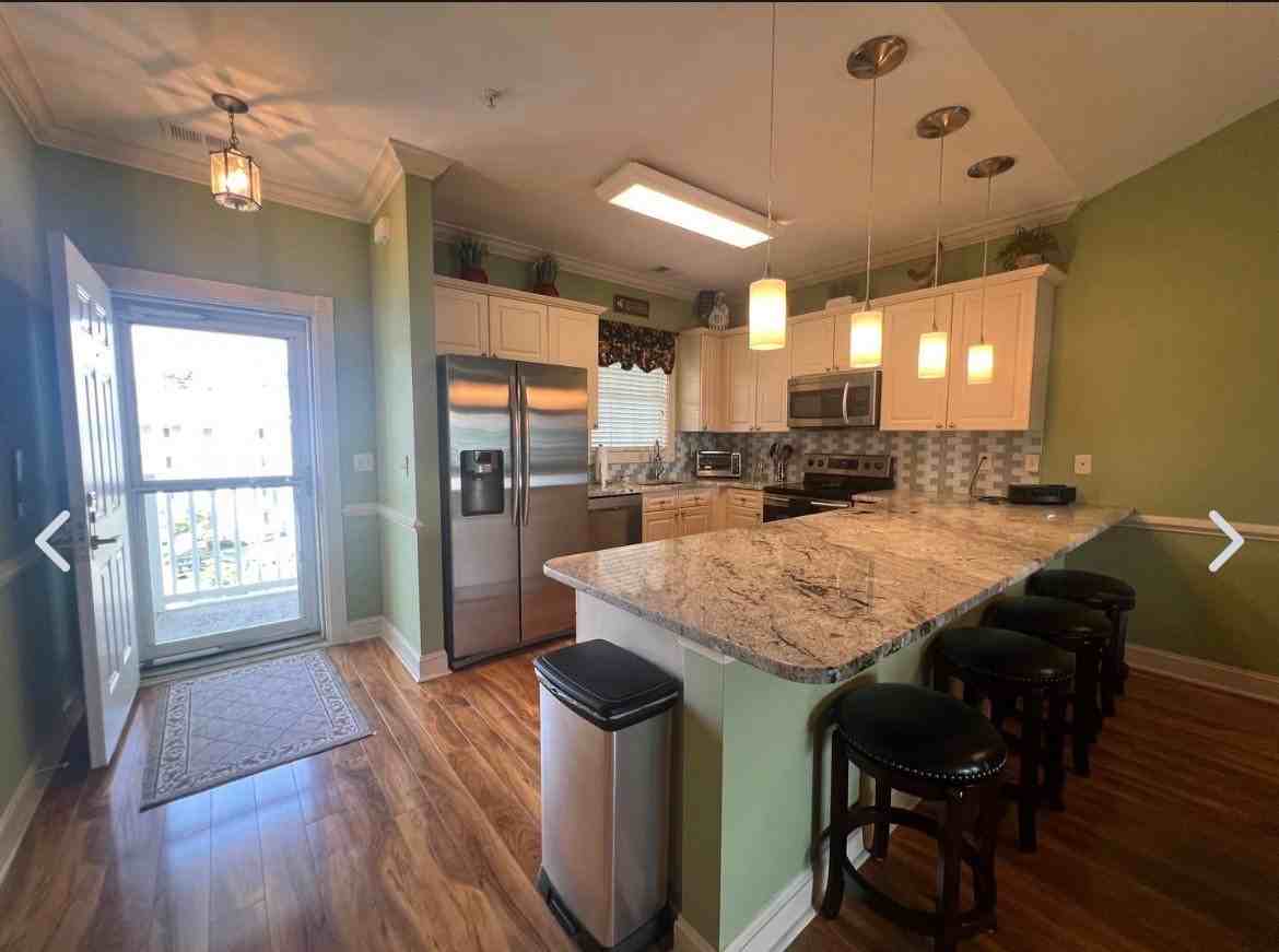 4887 Luster Leaf Cir #402 - Photo 2 of 13