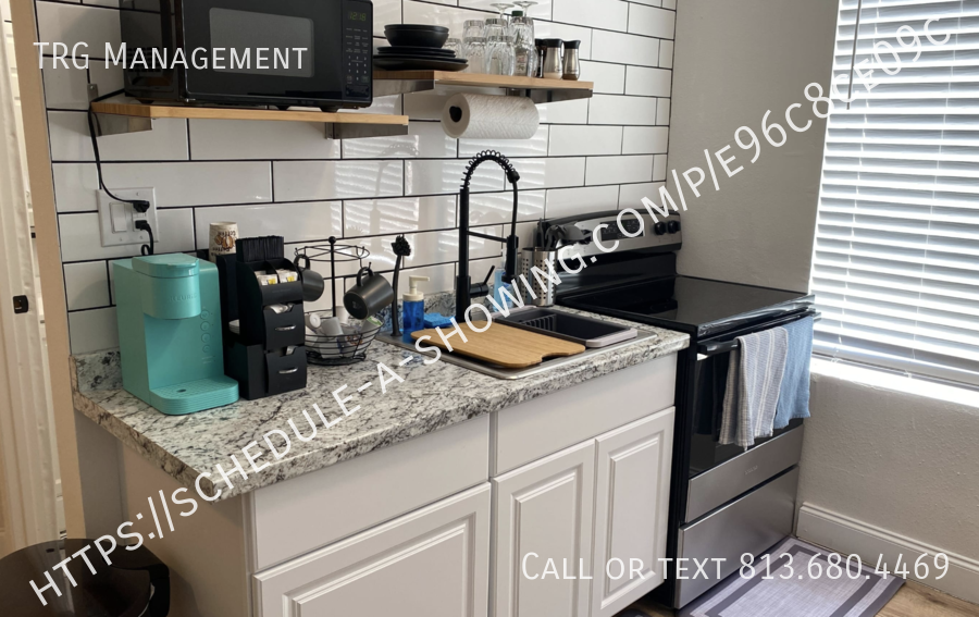 911 E 23rd Ave #9 - Photo 4 of 15