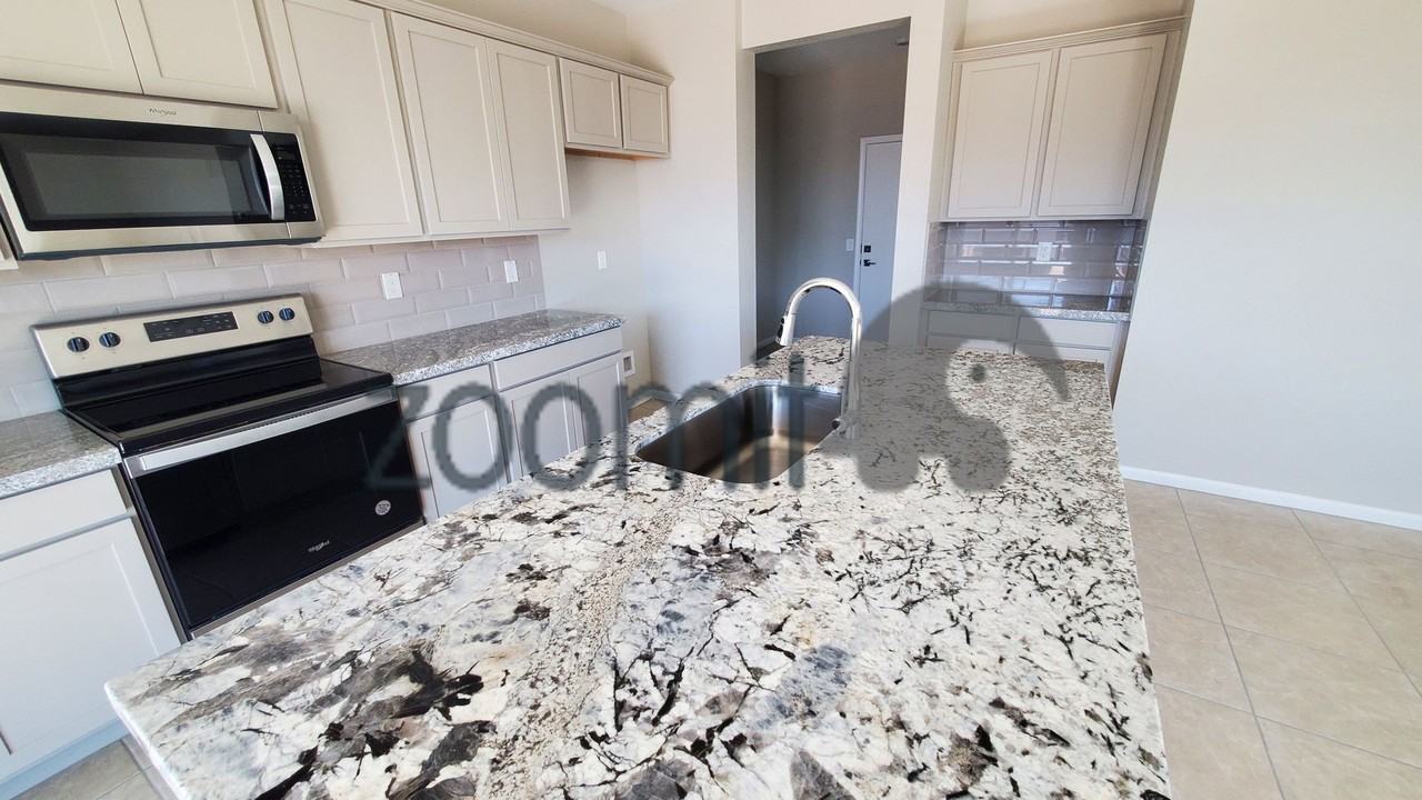 2027 E Wetleaf Pl - Photo 4 of 33