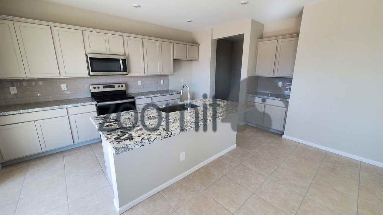 2027 E Wetleaf Pl - Photo 6 of 33