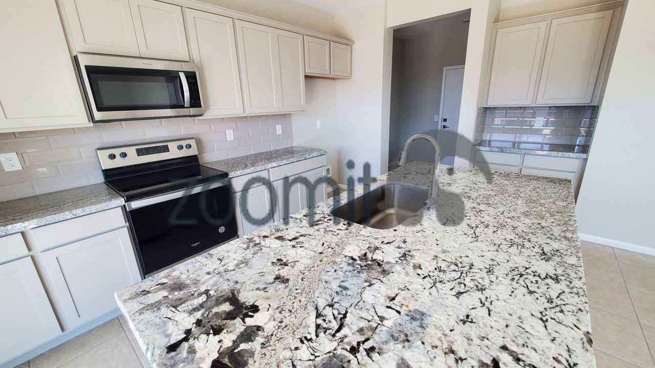 2027 E Wetleaf Pl - Photo 7 of 33