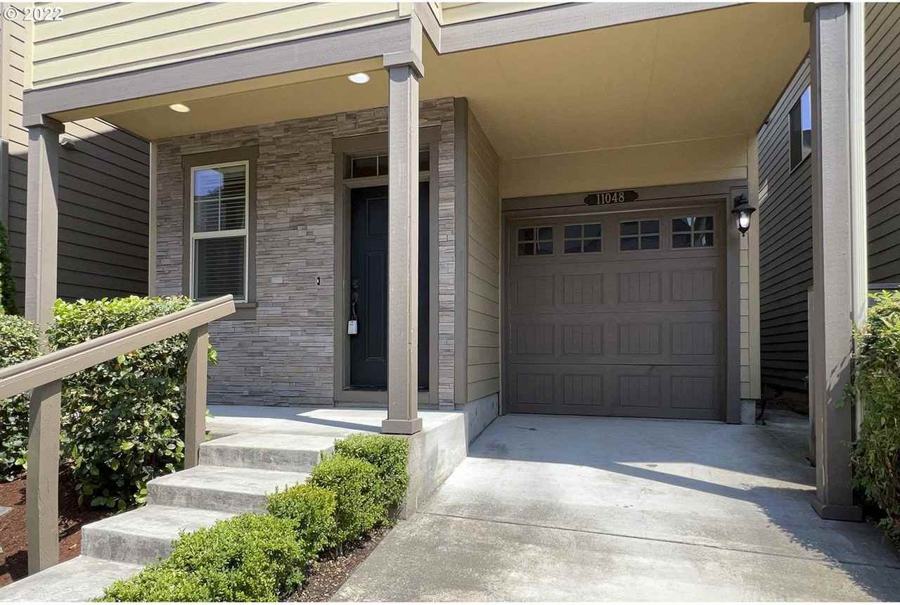 11048 Sw Legacy Oak Way - Photo 2 of 32