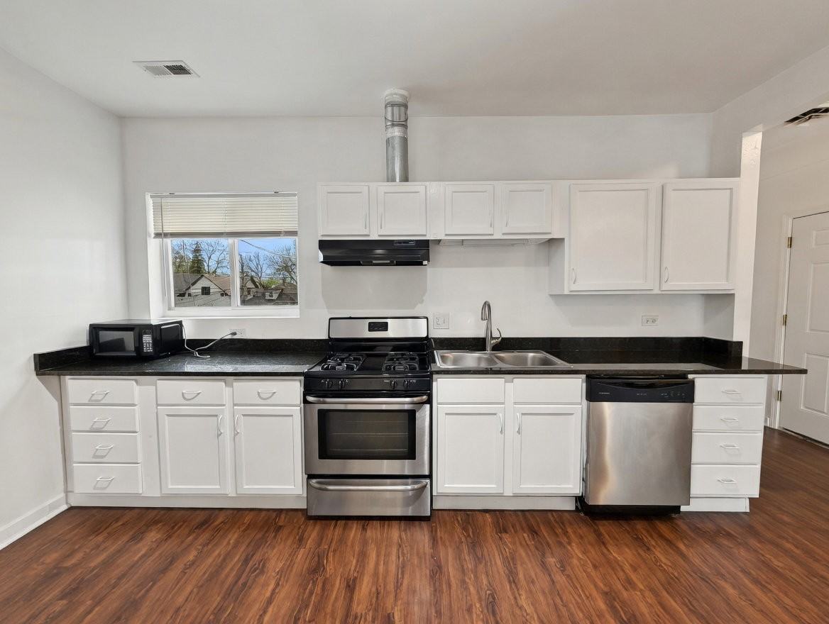 5833 W Irving Park Rd #1F - Photo 2 of 8
