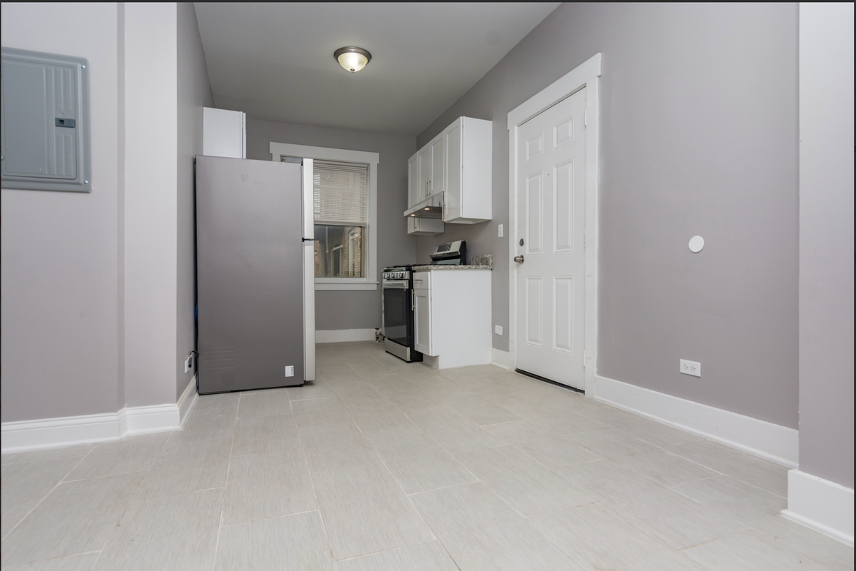 311 E 69th St - Photo 3 of 8