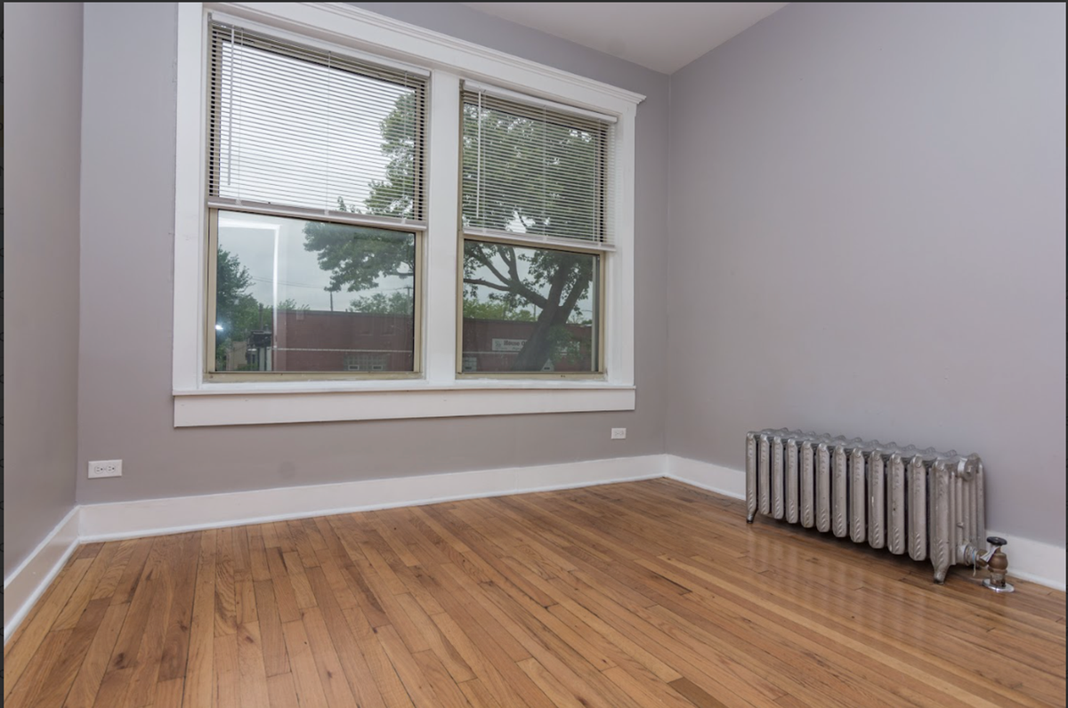 311 E 69th St - Photo 5 of 8