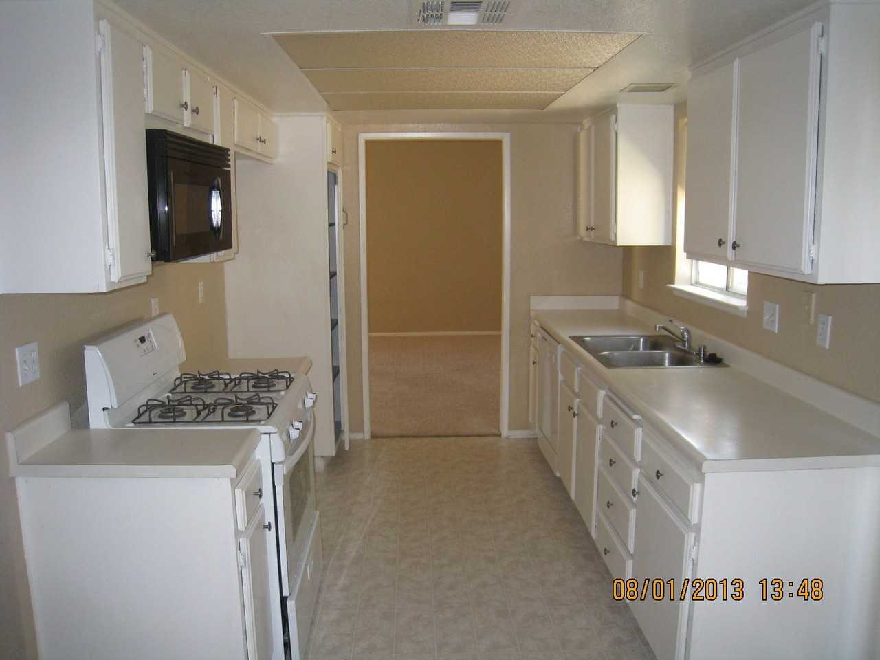 80916 Granby Ave N - Photo 3 of 5