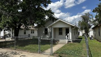 featured image of 910 E 3rd Ave #1