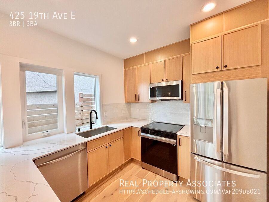 425 19th Ave E - Photo 7 of 35