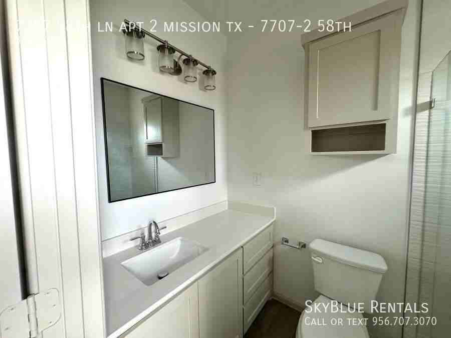 58TH LN APT 2 & - Photo 6 of 11