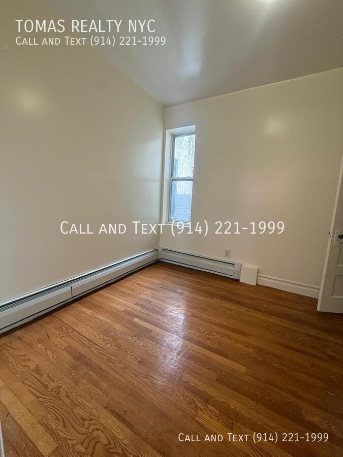 775 E 233rd St - Photo 4 of 14