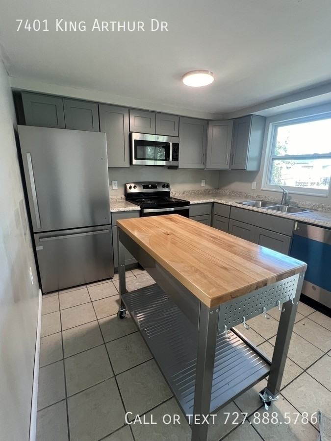 7401 King Arthur Dr - Photo 5 of 13