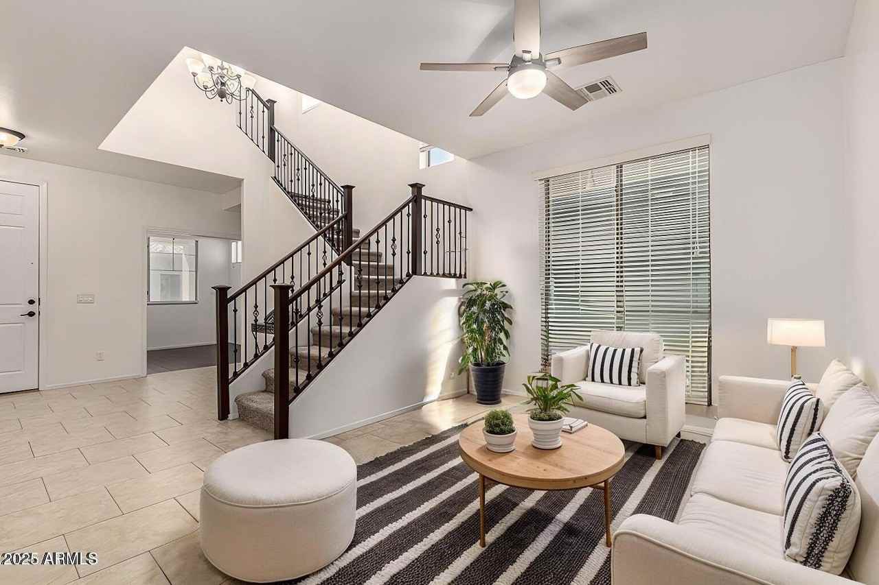 390 W Wisteria Pl - Photo 4 of 38