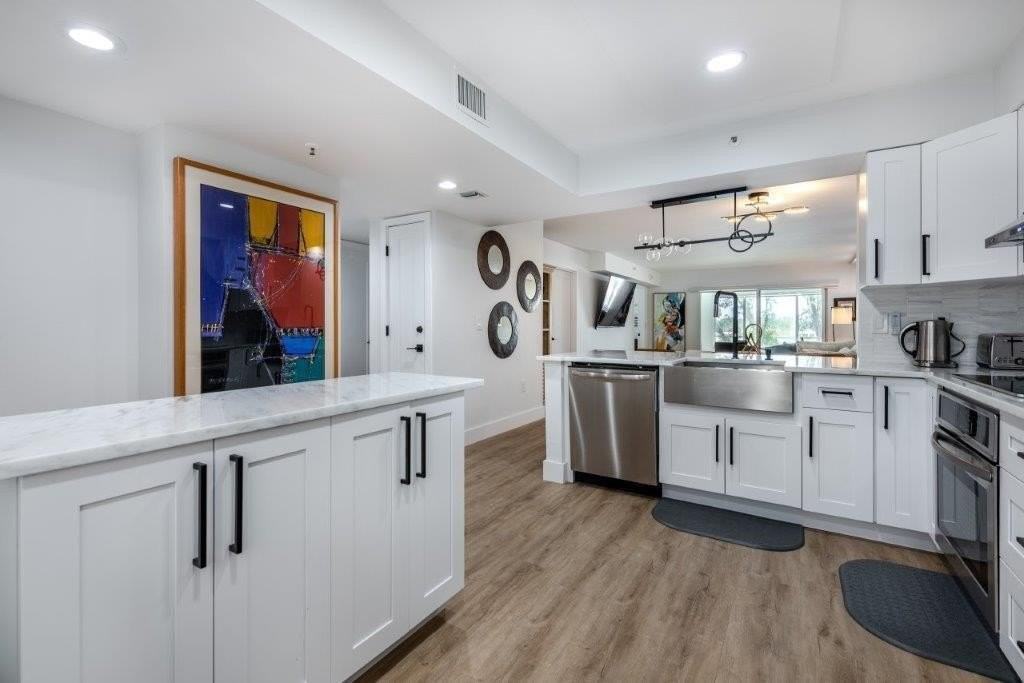 6096 Huntwick Ter #303 - Photo 3 of 48