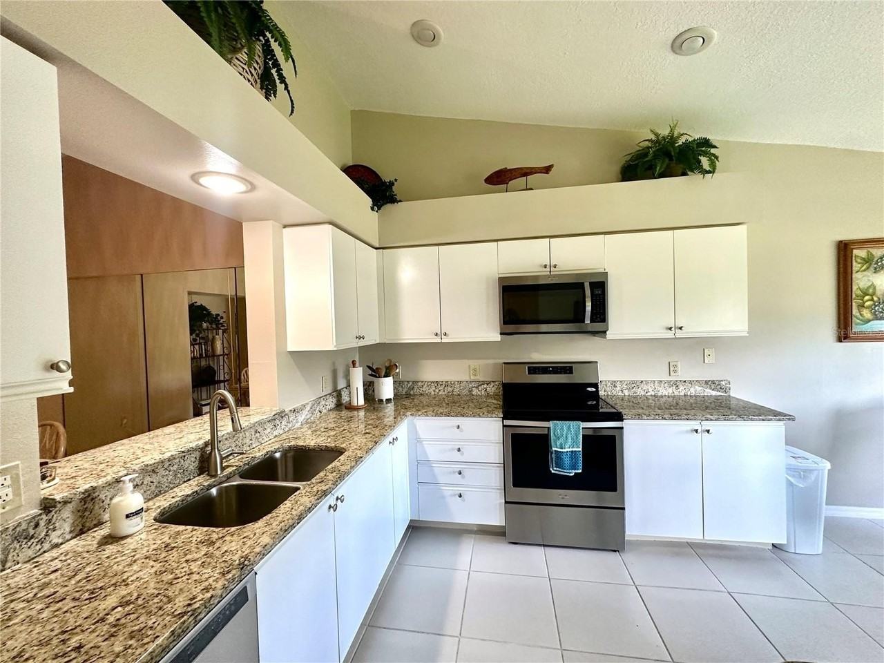 6713 Stone River Rd #202 - Photo 6 of 31