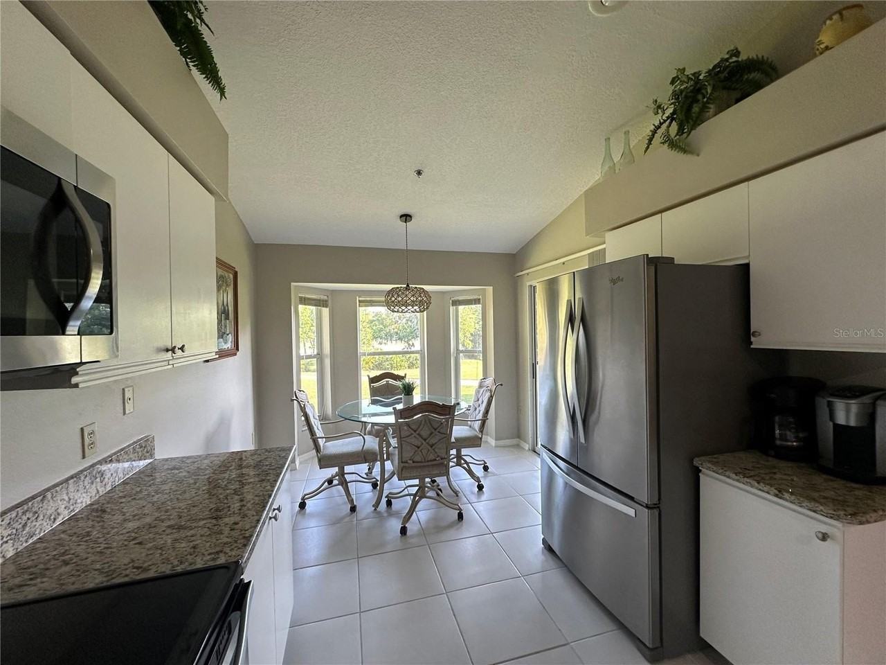 6713 Stone River Rd #202 - Photo 7 of 31