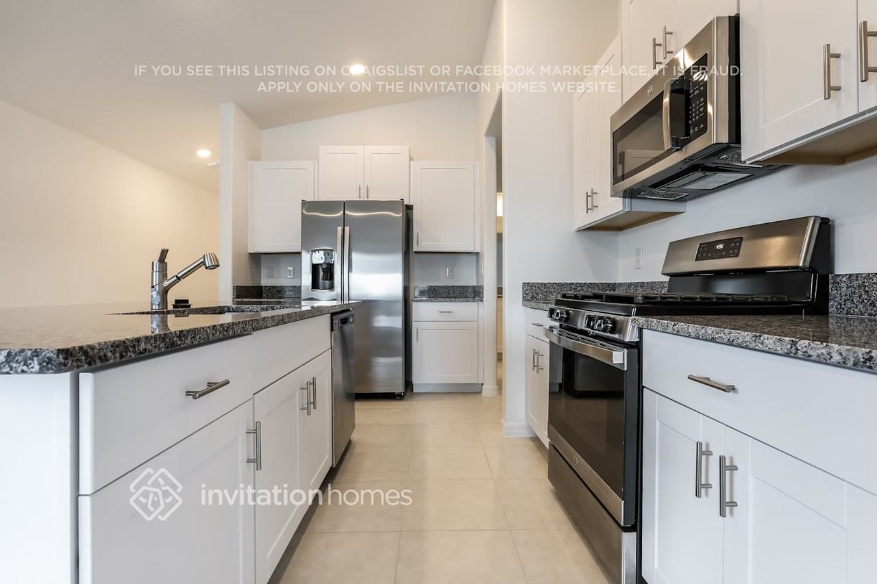 8615 41st Ave E - Photo 5 of 18