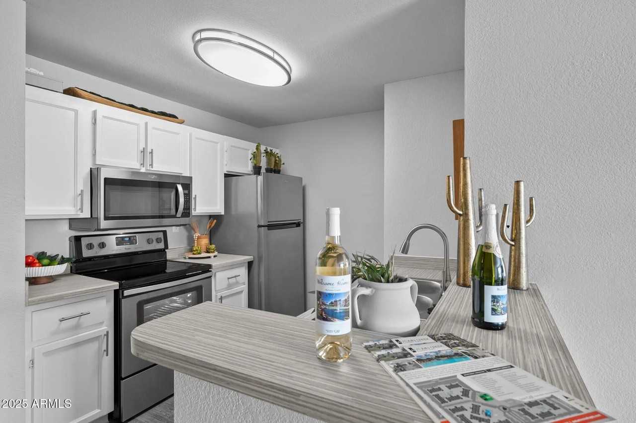 1320 N Mcqueen Rd #E1 - Photo 2 of 13