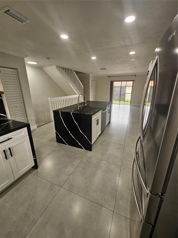 9846 Hammocks Blvd #107 - Photo 5 of 19