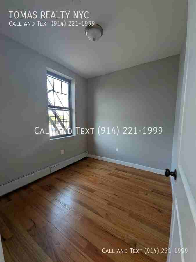 766 E 233rd St - Photo 2 of 5