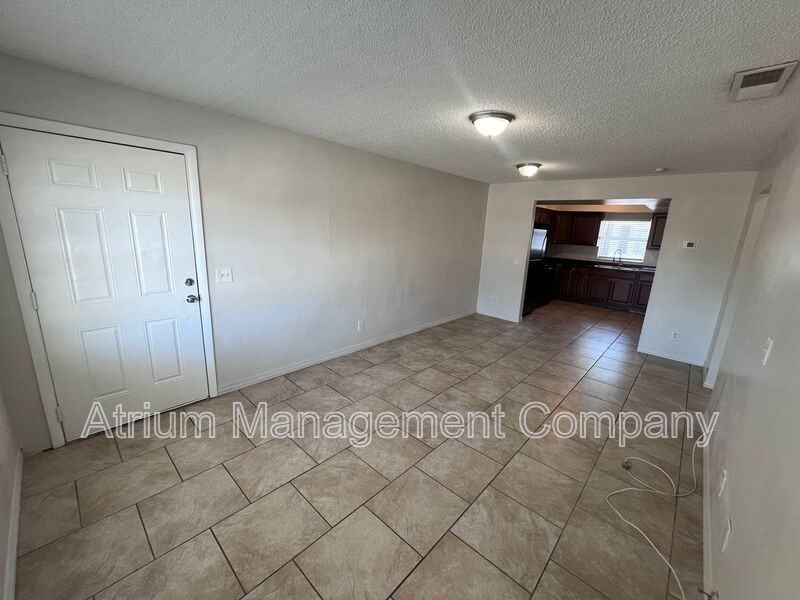 7106 S Kissimmee St #D - Photo 3 of 20