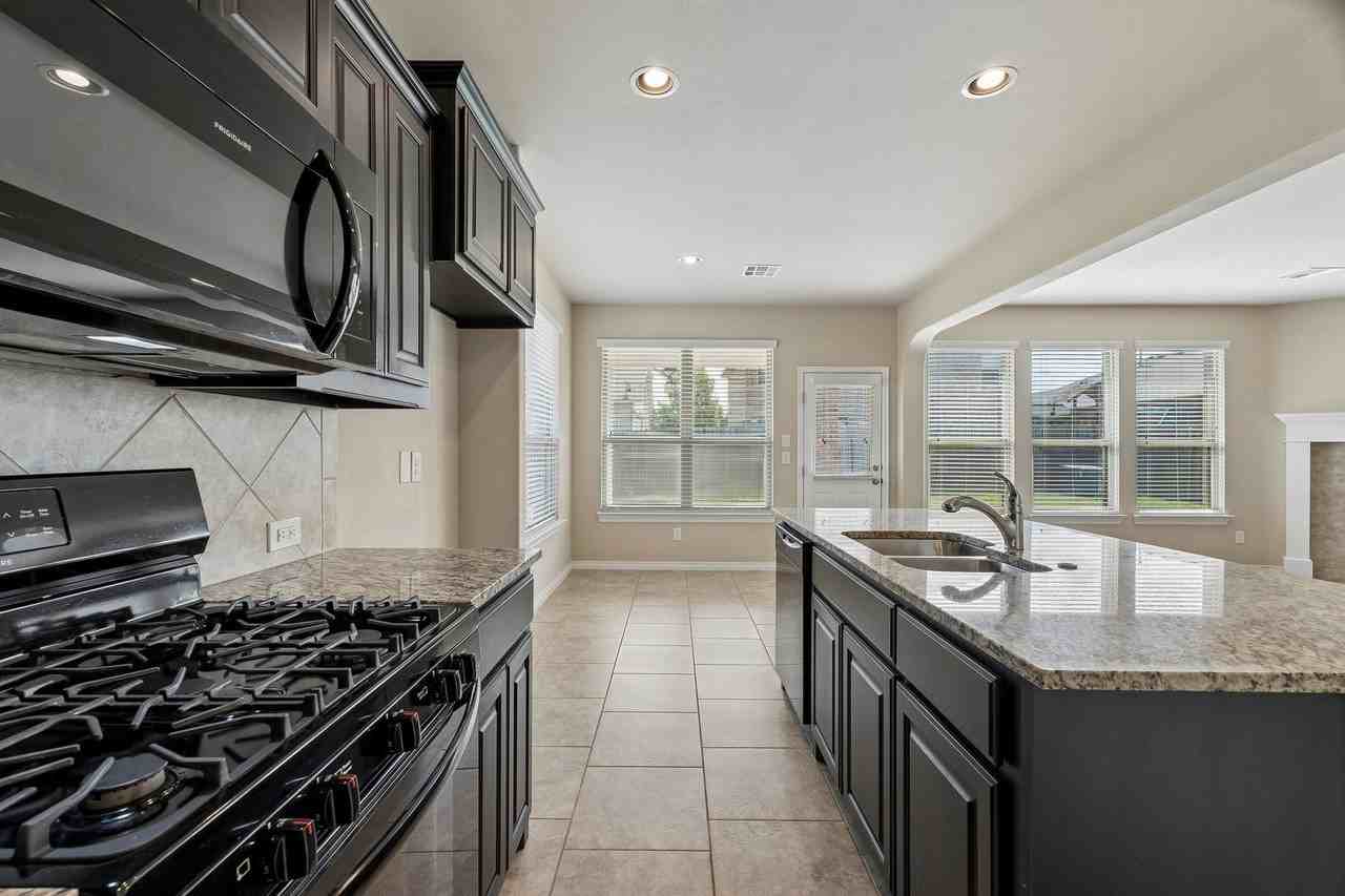 14808 Gravity Falls Ln - Photo 6 of 50