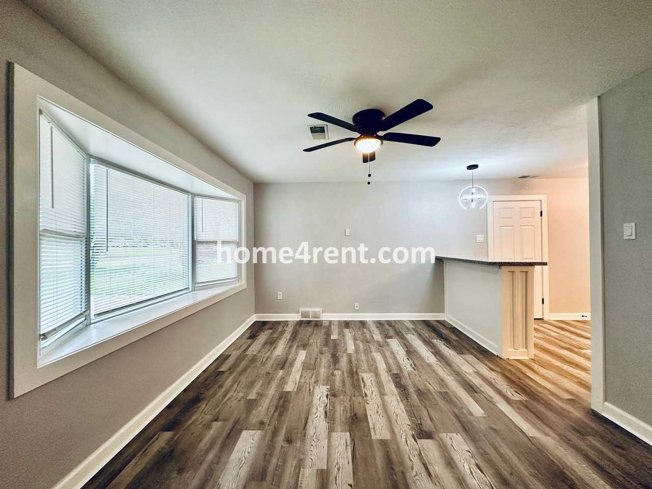 7119 E 111th Ter - Photo 4 of 32