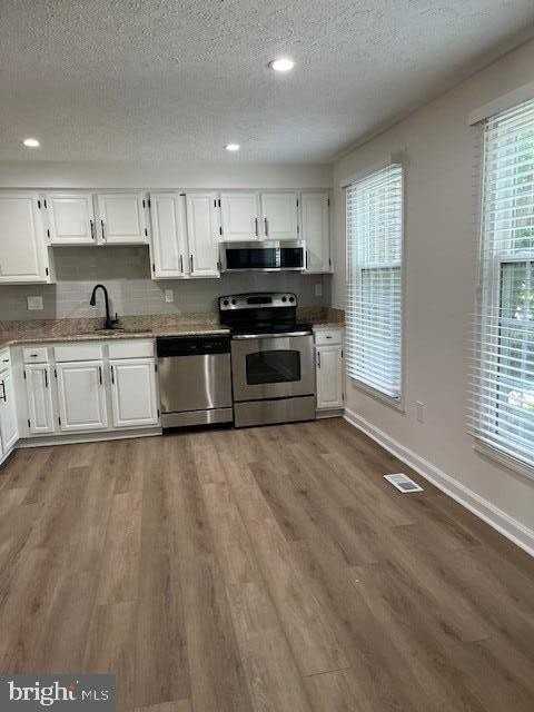 7511 Weatherby Dr - Photo 4 of 29