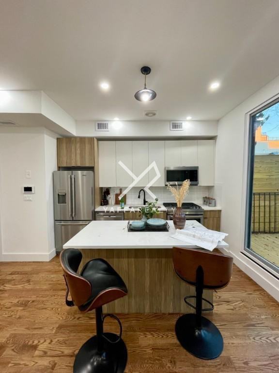 166 Covert St - Photo 3 of 10