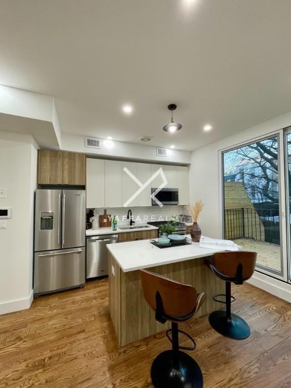 166 Covert St - Photo 5 of 10