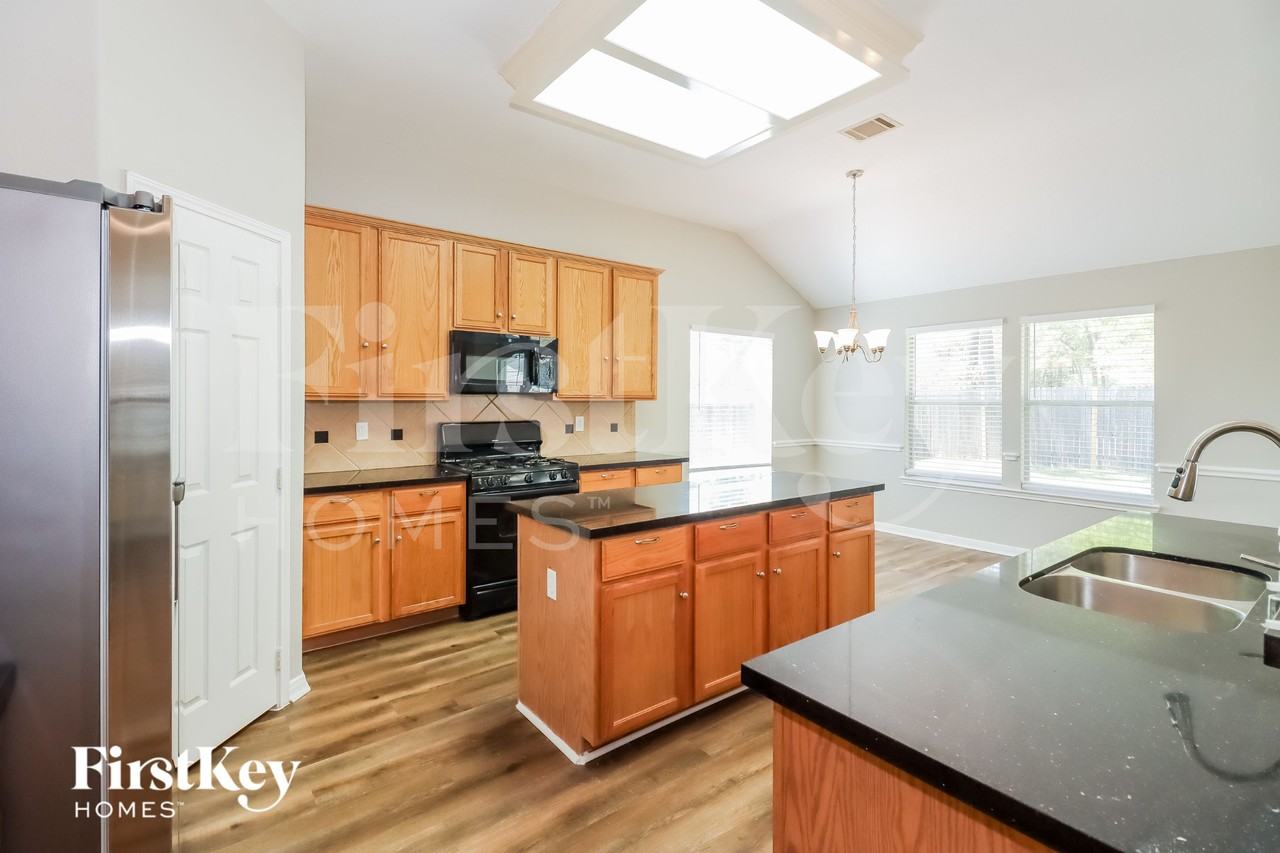 4515 Bridgevillage Dr - Photo 6 of 15