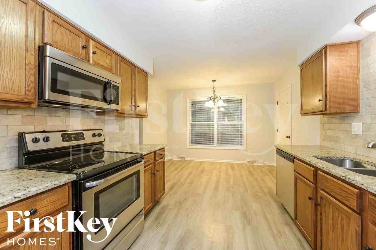 5905 Nw Whispering Oaks Ln - Photo 6 of 15