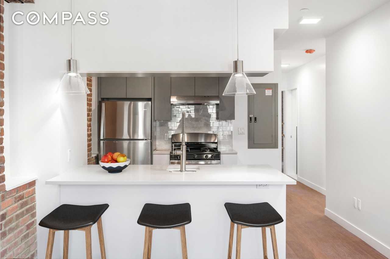 406 W 52nd St #2 - Photo 3 of 9